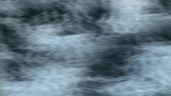 An abstract video image reminiscent of static on a screen